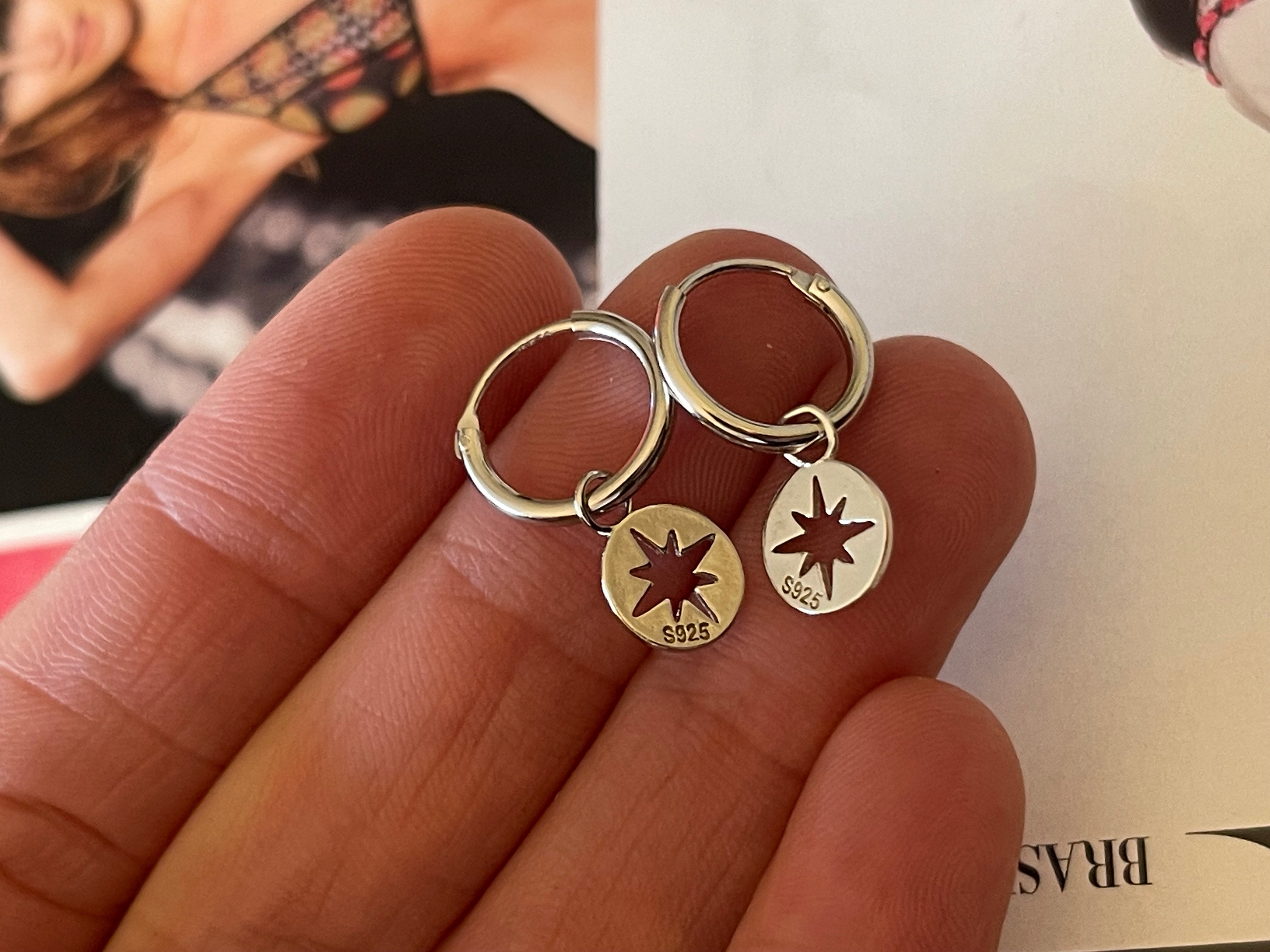 Aros Hippie Chic tipo argollas bañados en plata con preciosa estrella del norte. Largo 2 cm.